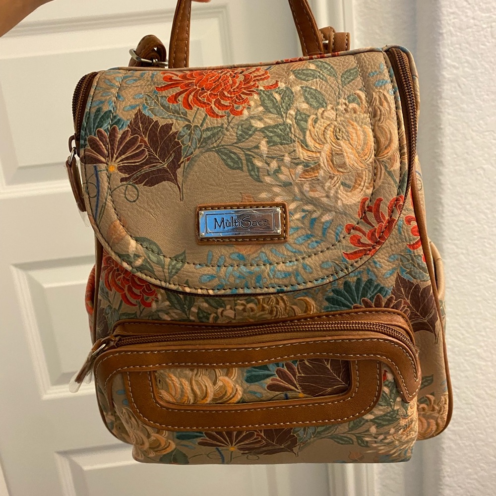multicolored compact backpack with 9 pockets
